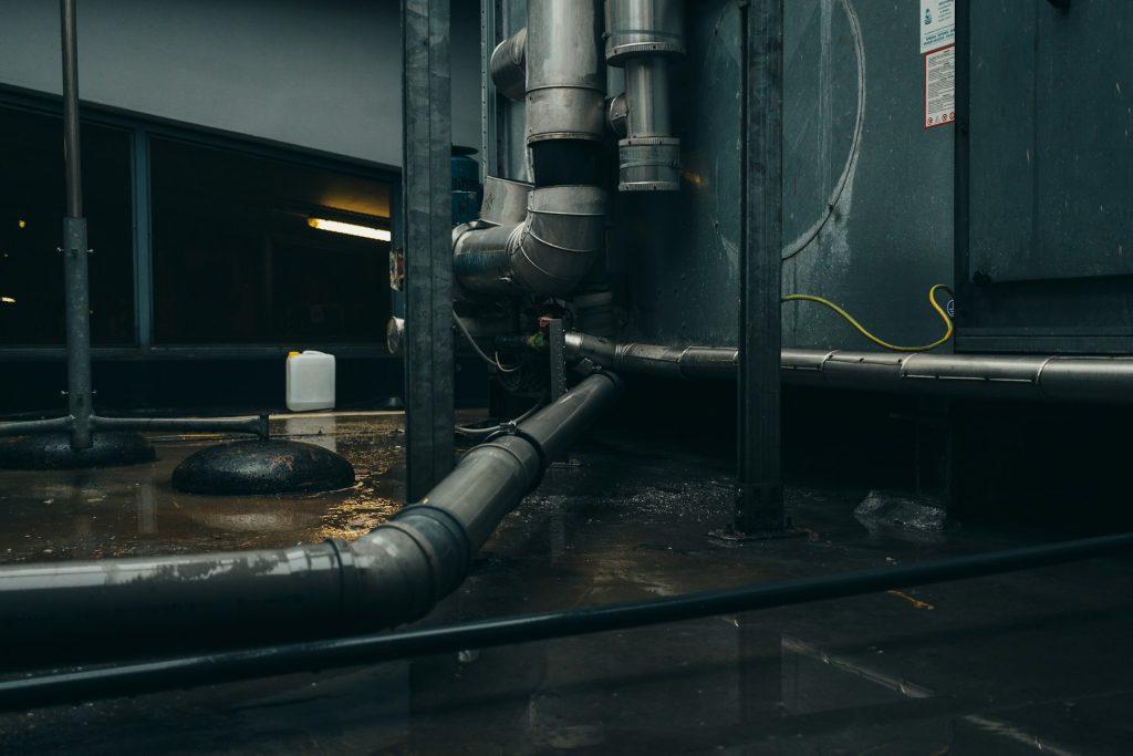 Pool equipment room with filtration plumbing